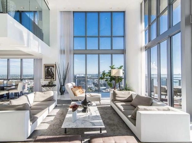 Double-height waterfront glazing in a South Florida residence